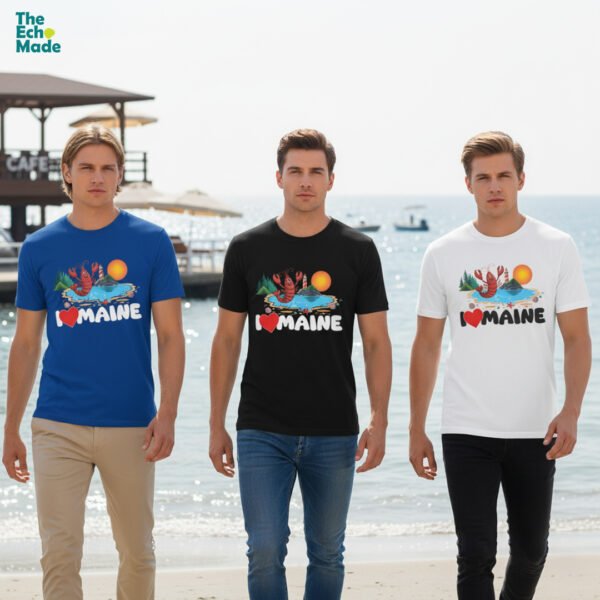 Three men wearing I Love Maine lobster graphic t-shirts in blue, black and white on beach